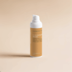 C+ Glow Booster Serum is Vitamin C Face Serum and is standing upright on beige background with clean lighting